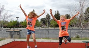 children jumping on a trampoline